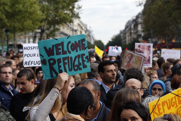 Migrants en France : initiatives locales et nationales