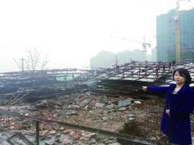 De retour de voyage, une Chinoise trouve sa maison démolie au bulldozer