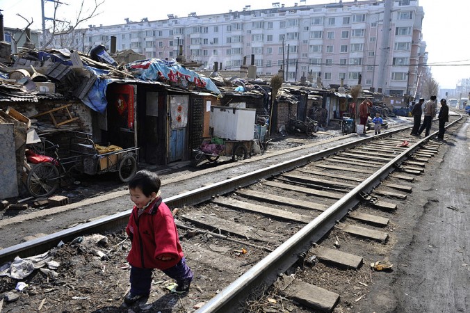 Les fonctionnaires du Parti communiste chinois trompent les plus pauvres avec des projets immobiliers