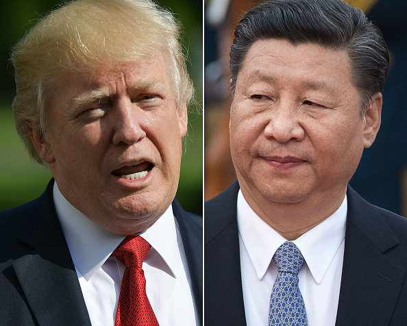 Trump arrive en Chine après une « main tendue » à Kim Jong-Un