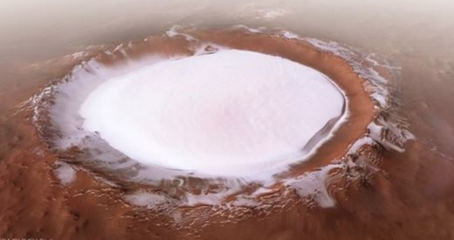 Un cratère géant rempli de glace découvert à la surface de Mars
