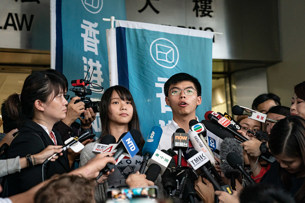Hong Kong: coup de filet dans le camp pro-démocratie avant un week-end tendu