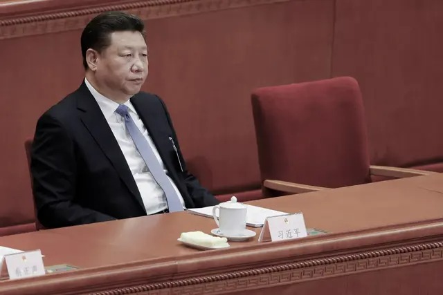 Le dirigeant chinois Xi Jinping assiste à la session d'ouverture du Congrès national du peuple, l'organe législatif suprême de la Chine, au Grand Hall du peuple à Pékin, le 5 mars 2017.